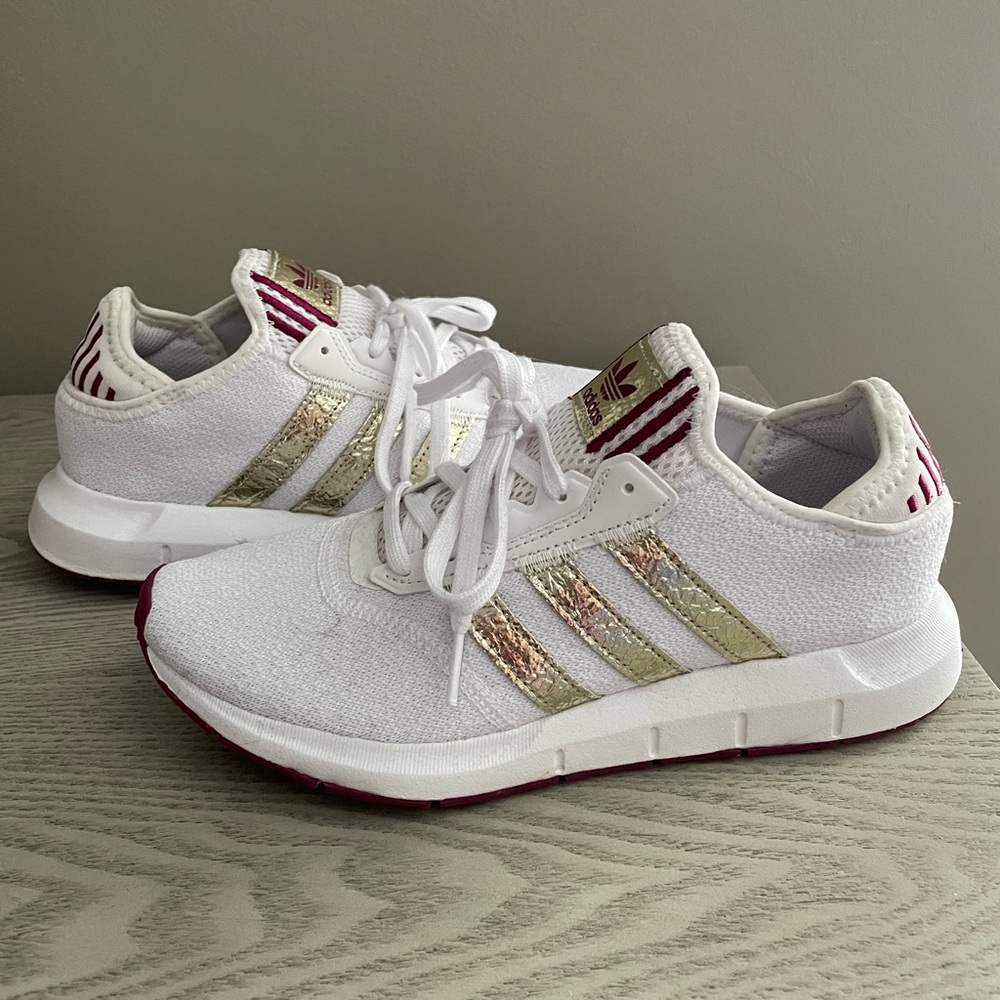 adidas White Sneakers with Metallic Gold Stripes and Burgundy Accents